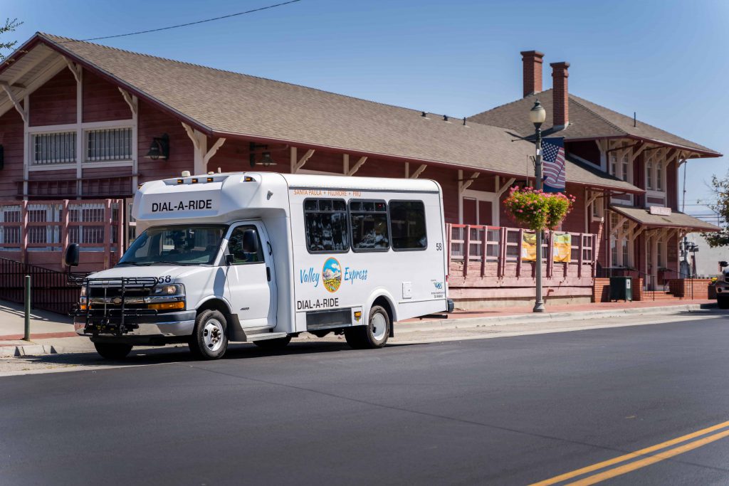 Valley Express bus with park in background